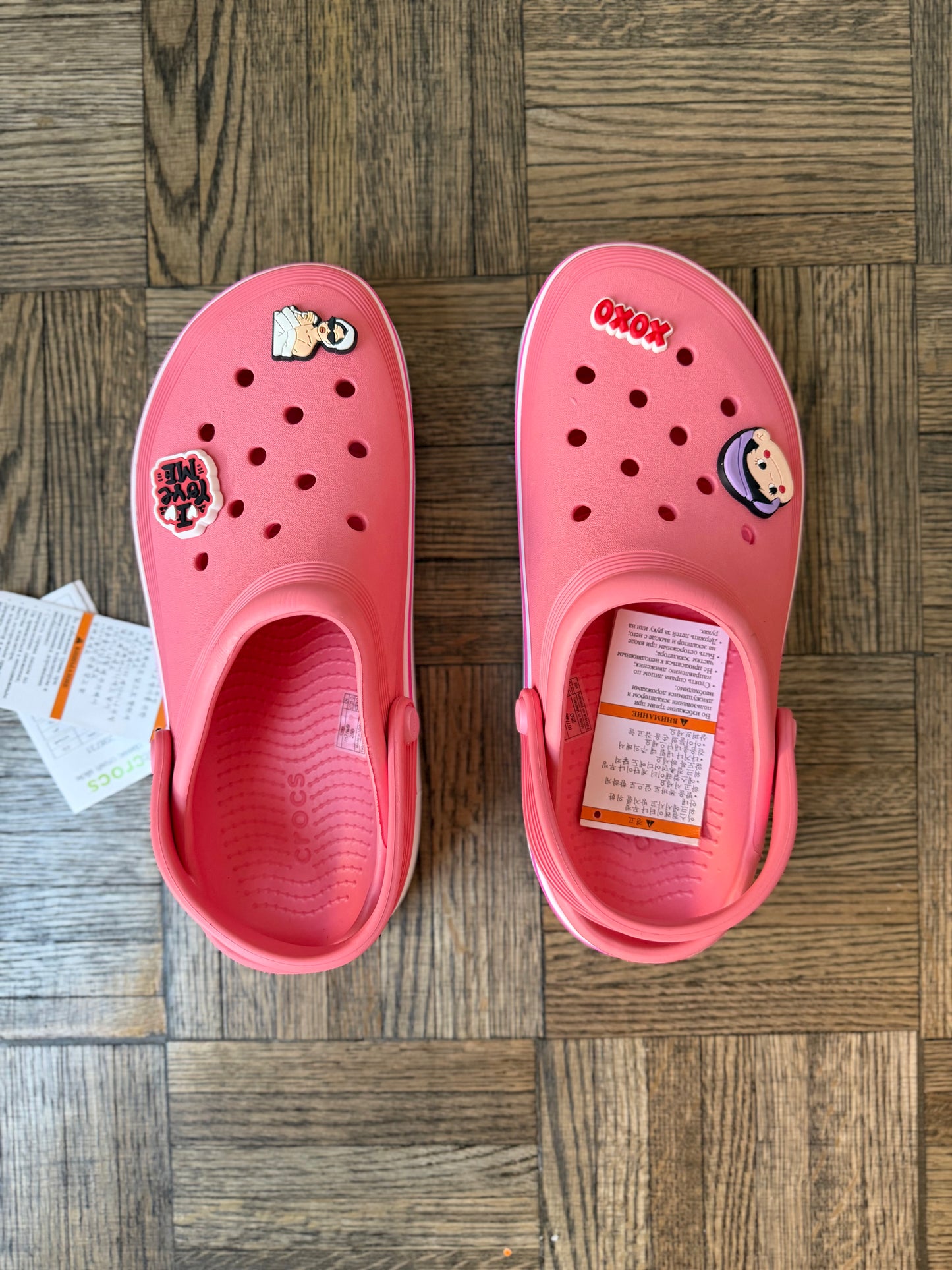 PINK CROCS CLASSIC CLOGS WITH JIBBITZ CHARMS